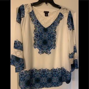 Ladies top with lacy back and inset on arms